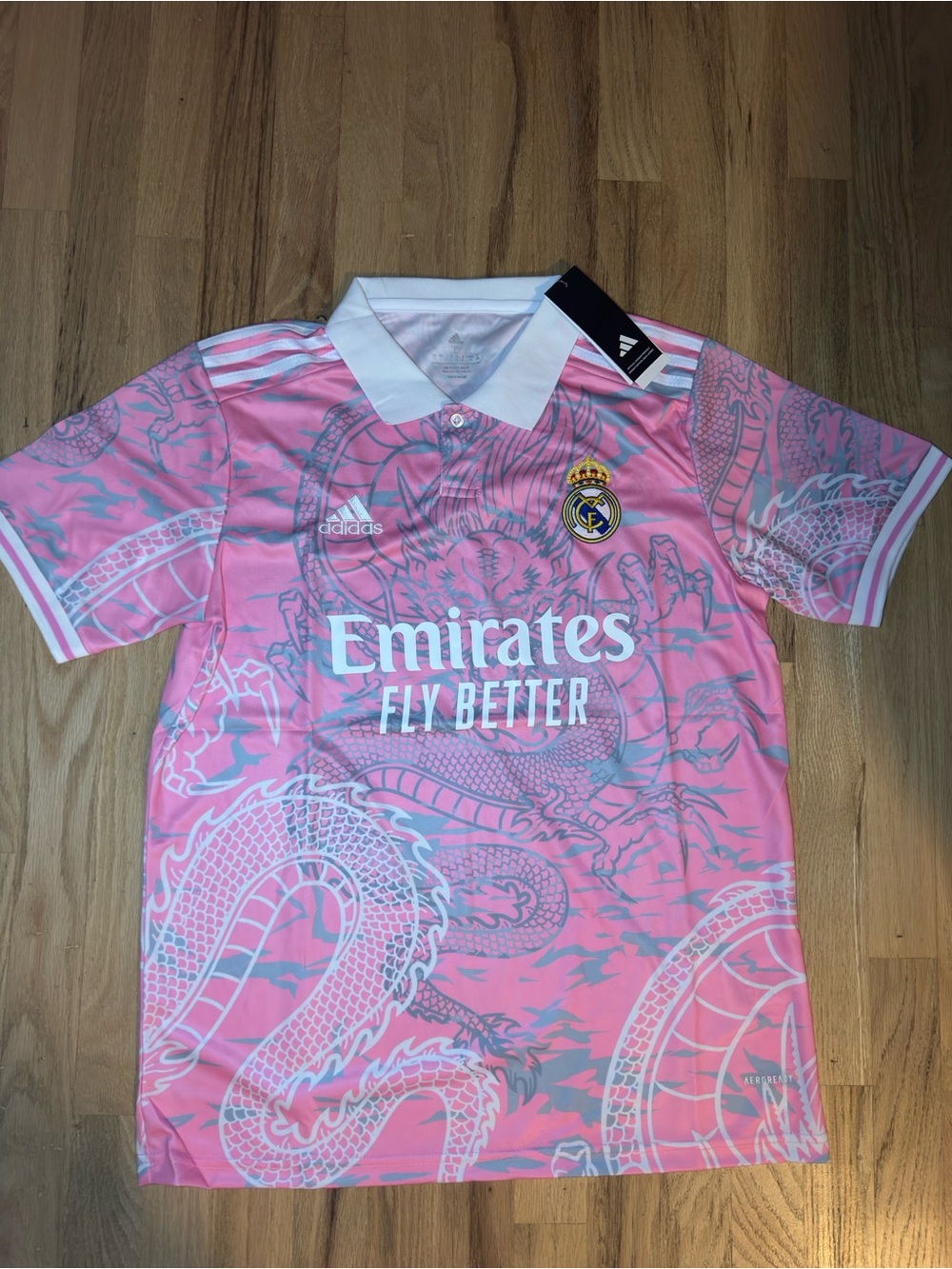 adidas mens Pink Real Madrid Dragon Soccer Jersey